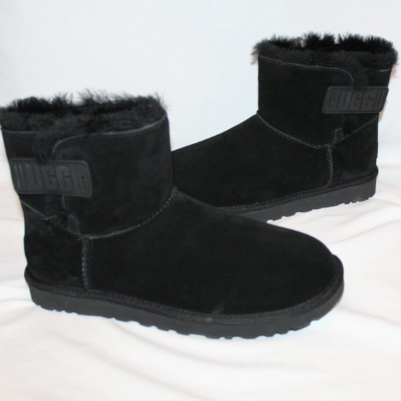 NIB‎ UGG LOGO STRAP MINI SUEDE SHEARLING LINED ANKLE BOOTS BLACK - Picture 1 of 9